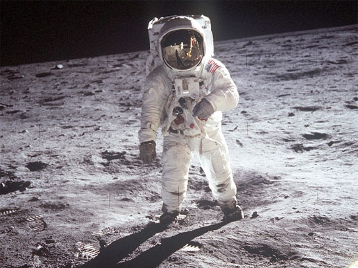 Apollo 11 astronaut Buzz Aldrin walks on the surface of the moon near the leg of the lunar module Eagle